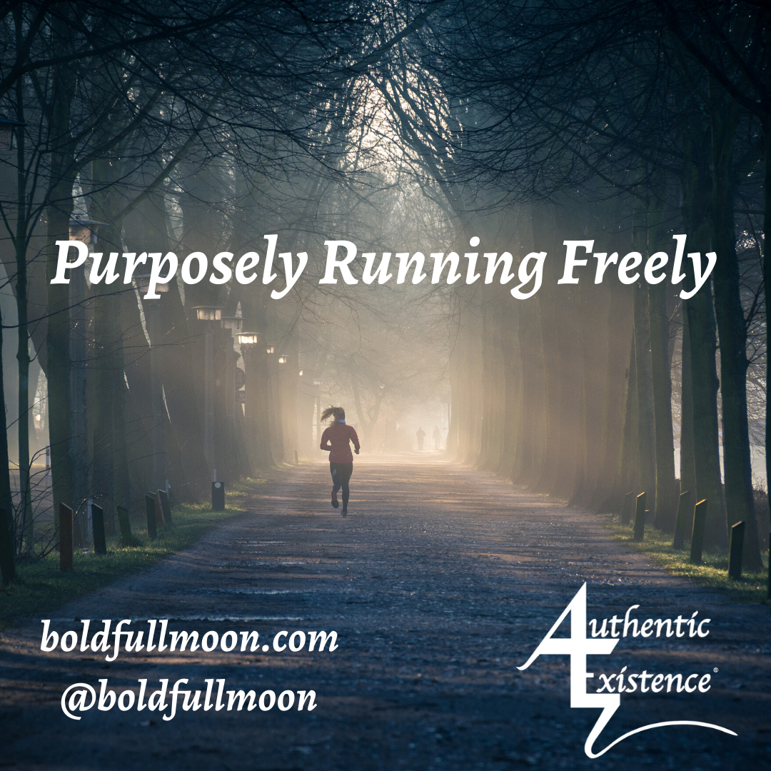 Runner running freely down a path.
